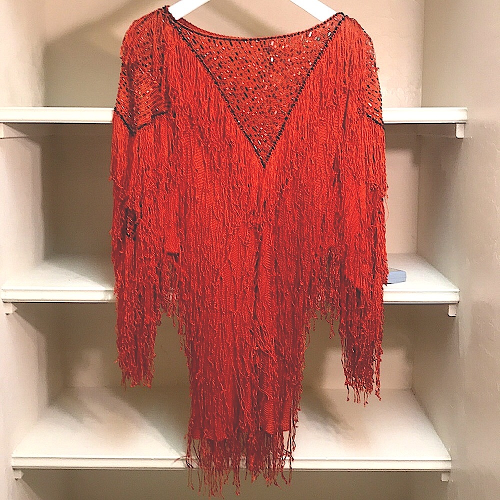 A fabulous mini dress, a top or a cloak?